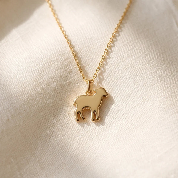 Little Lamb, a sealed 18K gold lamb pendant necklace, a keepsake gift for baptism