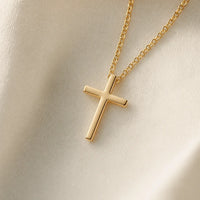Milestone Cross, a sealed 18K gold cross necklace, a keepsake gift for First Communion