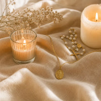 Our Lady Watches, a sealed 18K gold Our Lady medal necklace, a keepsake gift for protection
