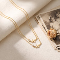 Sisters, two matching sealed 18K gold necklaces, a keepsake gift for sisters