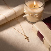 The Vow, a sealed 18K gold crucifix necklace, a keepsake gift for Confirmation