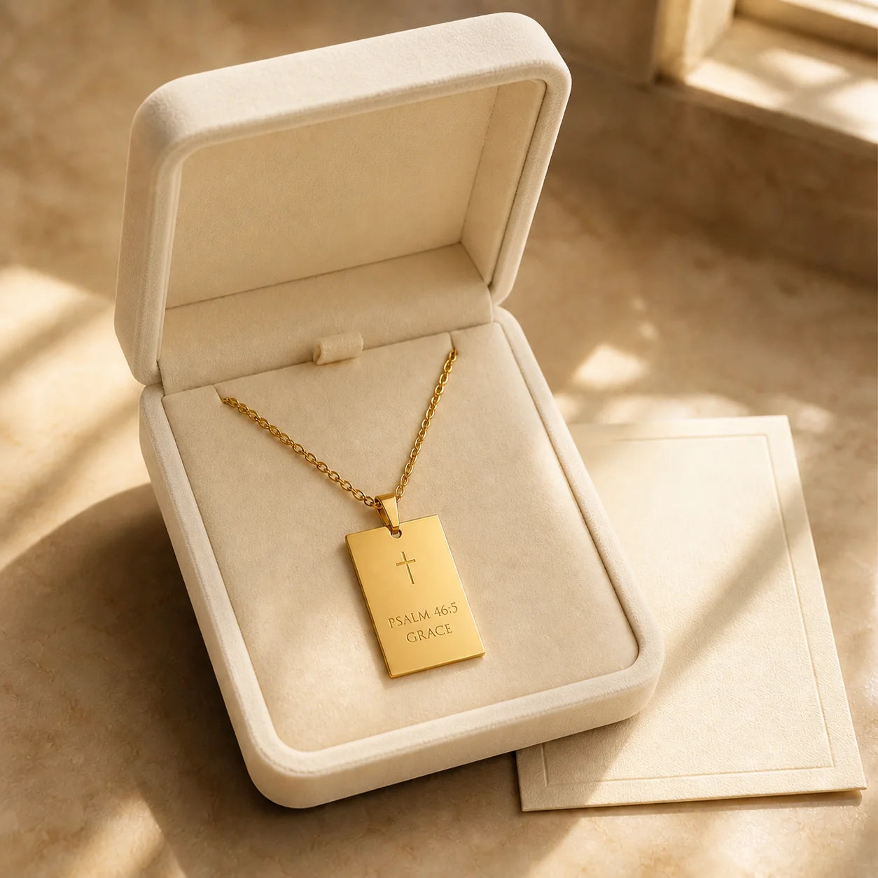 Amada necklace presented in a cream keepsake box